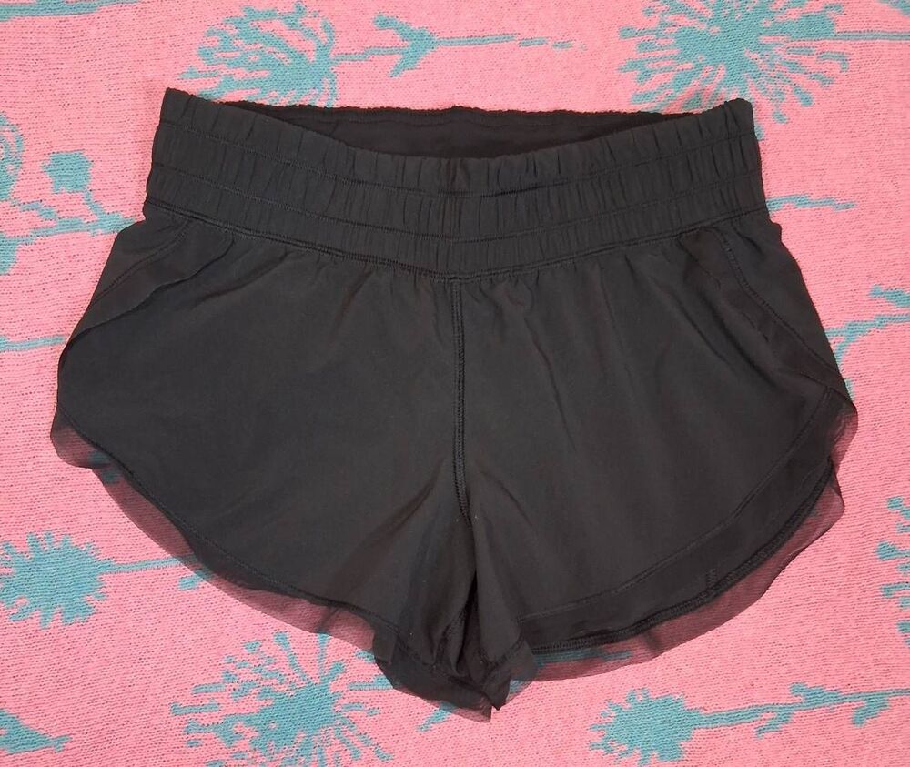 Lululemon womens size 4 mesh hem black running shorts gym Activewear athletic